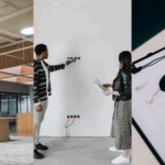Office Sector Stabilization, Due Diligence, and Investment Opportunities. Image of desks in an office space (right), people inspecting wires in a wall (middle), and a magnifying glass on a piece of paper clipped to a clipboard (left).